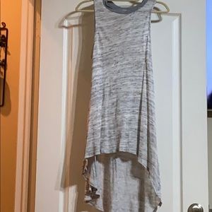 Gray Sleeveless knitted light blouse/mini dress.